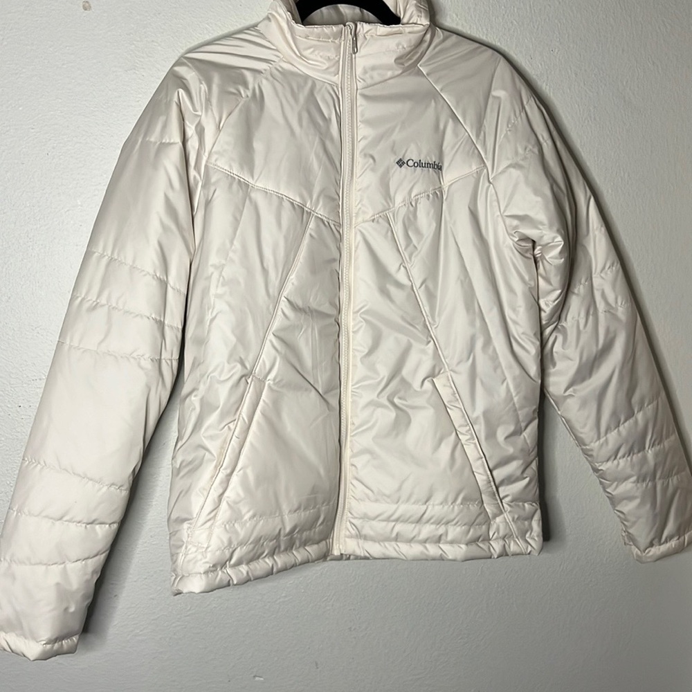 White puffy Columbia jacket
